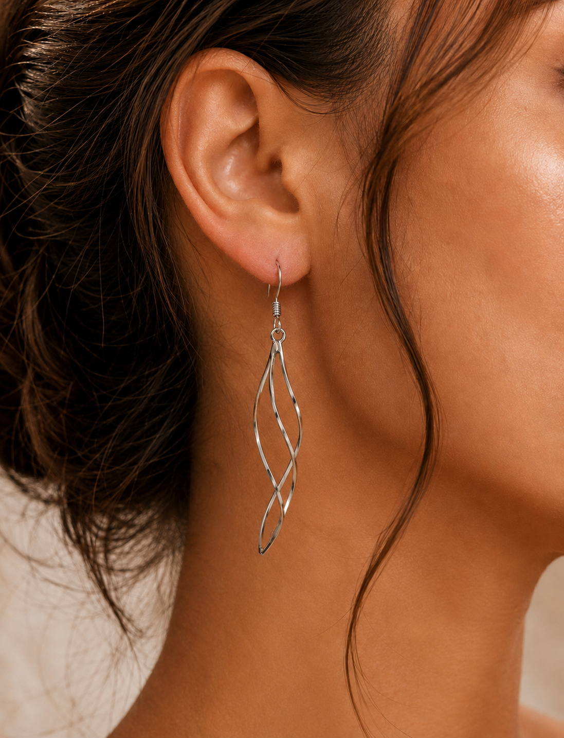 Ethereal Twist Ribbon Earrings in 925 sterling silver – angle view